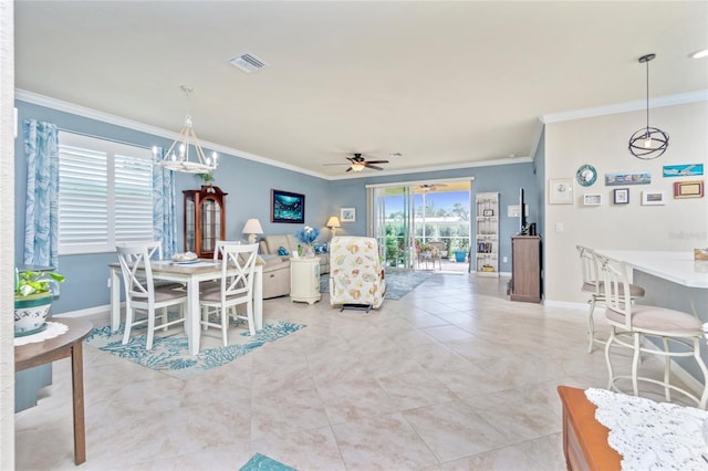 dining area with ceiling fan, light tile patterned floors, and crown molding