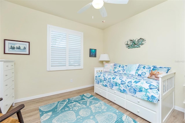 bedroom featuring ceiling fan and light wood-type flooring