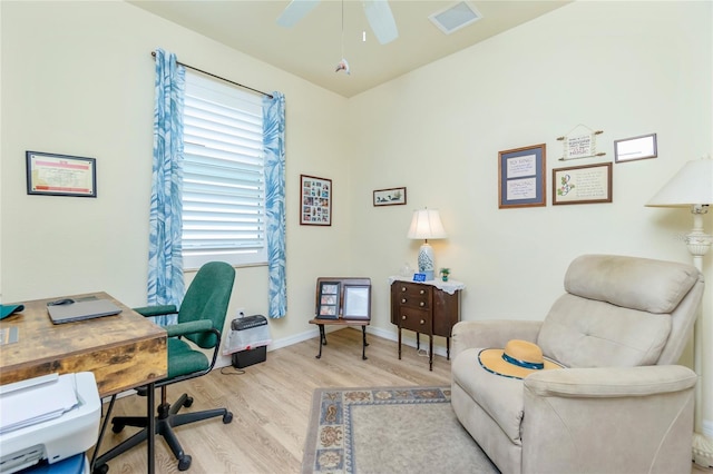 office with ceiling fan and light wood-type flooring