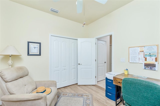 home office featuring ceiling fan and light wood-type flooring