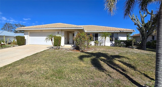 view of front facade with a garage and a front lawn