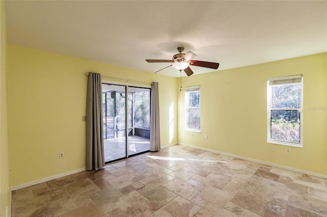 unfurnished room with ceiling fan