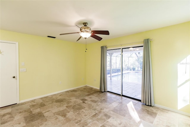 unfurnished room with ceiling fan