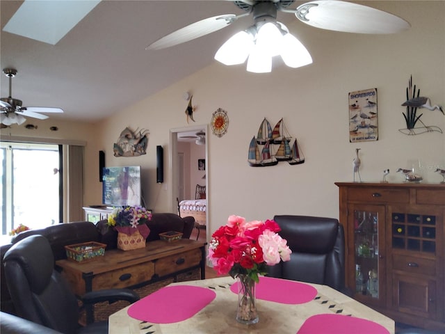 interior space featuring ceiling fan and lofted ceiling