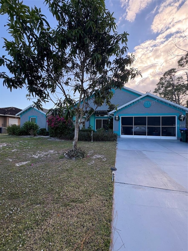 view of front of home with a front lawn