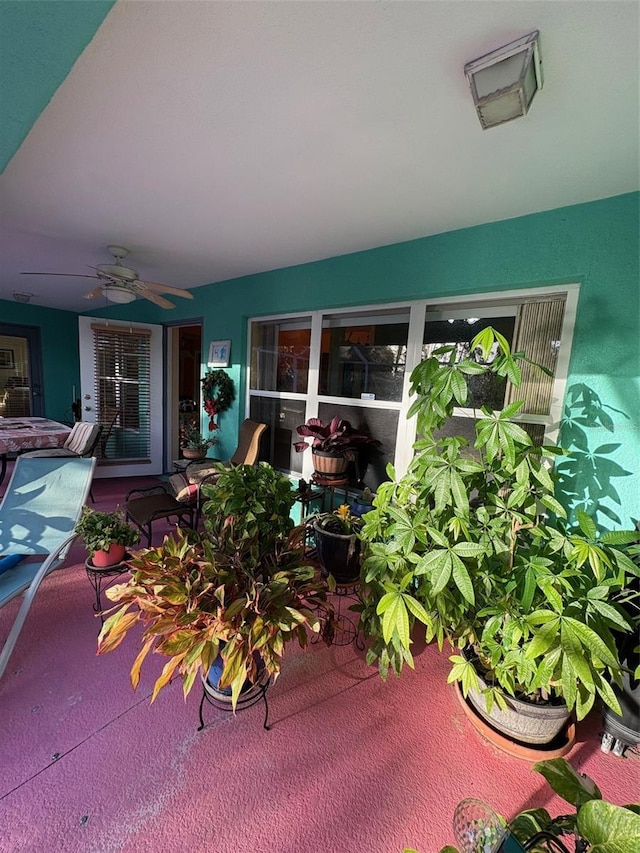 view of patio with ceiling fan