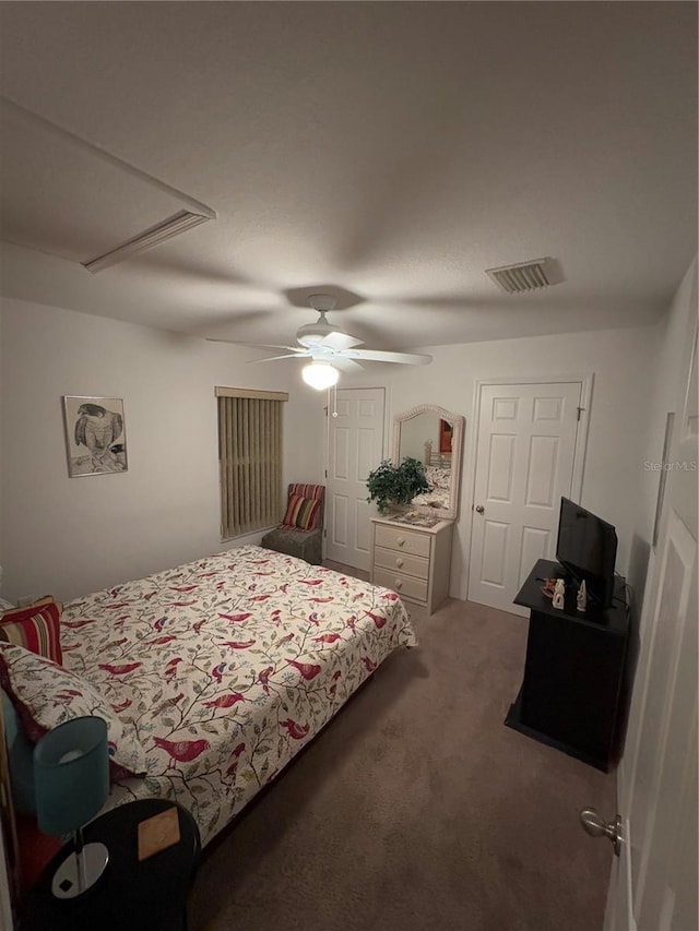 carpeted bedroom with ceiling fan