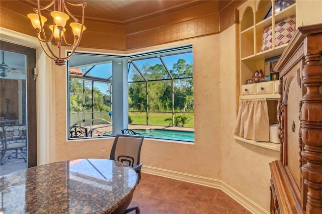 dining room featuring a chandelier