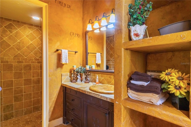 bathroom with vanity and an enclosed shower