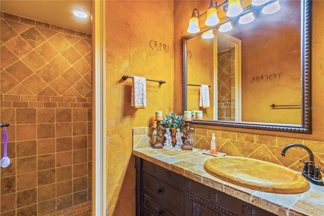 bathroom with vanity and backsplash