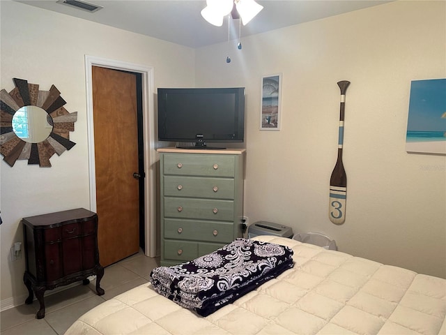 bedroom featuring light tile patterned flooring