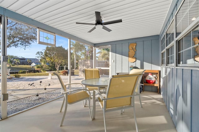 sunroom / solarium with ceiling fan