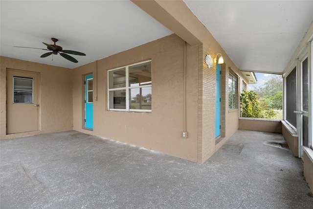 view of patio / terrace featuring ceiling fan