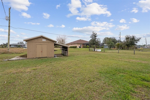 view of yard with a storage shed