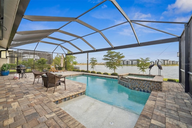 view of pool featuring an in ground hot tub, a water view, a patio area, and a lanai