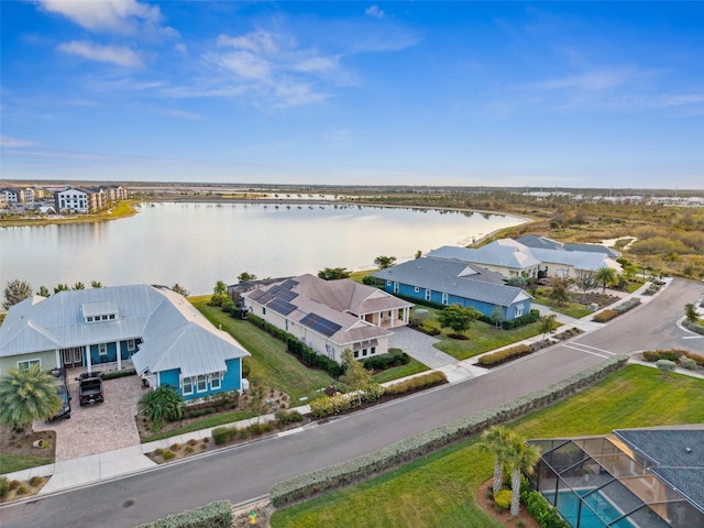 bird's eye view with a water view