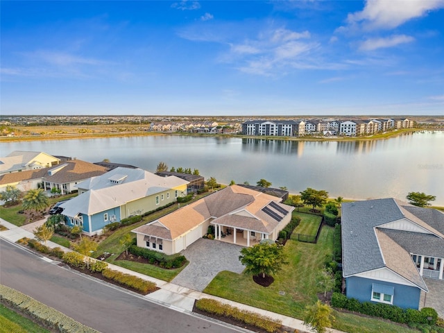 drone / aerial view featuring a water view