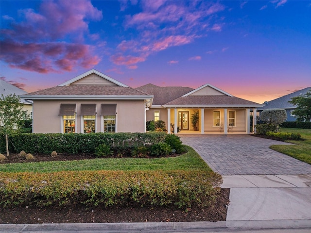 view of front of home with a yard