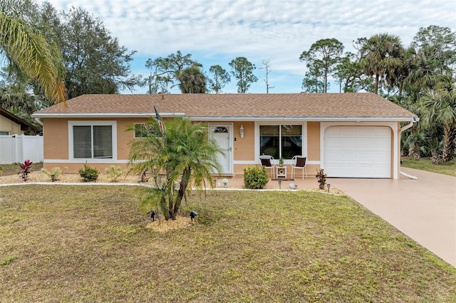 ranch-style house with a front lawn and a garage