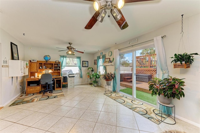 office with ceiling fan and light tile patterned flooring