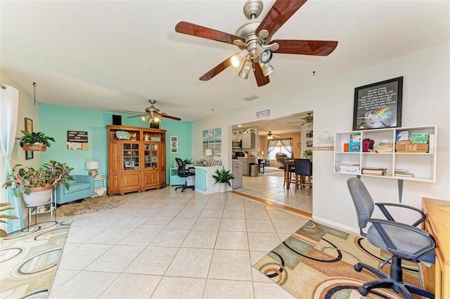 office with ceiling fan and light tile patterned flooring