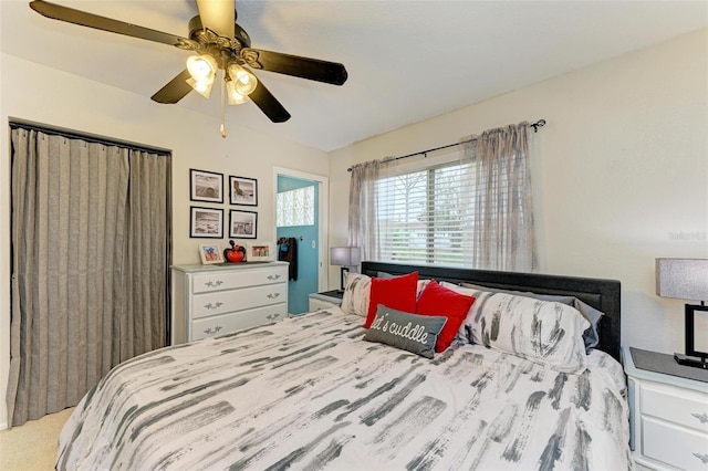 carpeted bedroom with ceiling fan