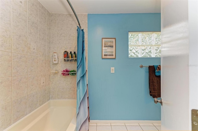 bathroom featuring shower / bath combination with curtain and tile patterned floors