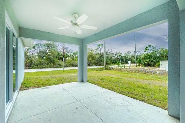 view of patio with ceiling fan