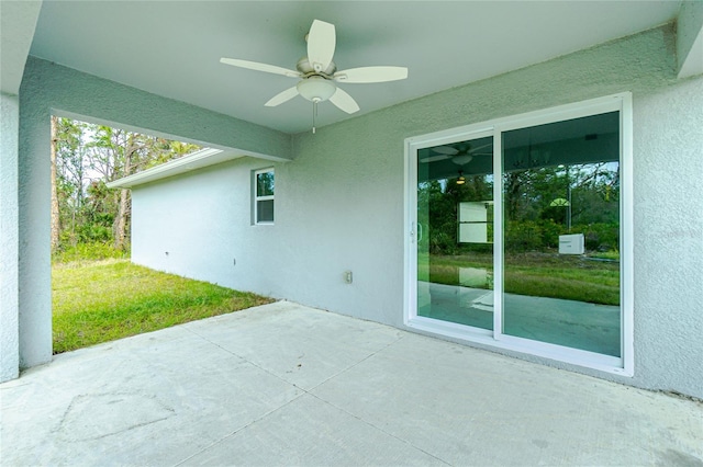 view of patio / terrace featuring ceiling fan