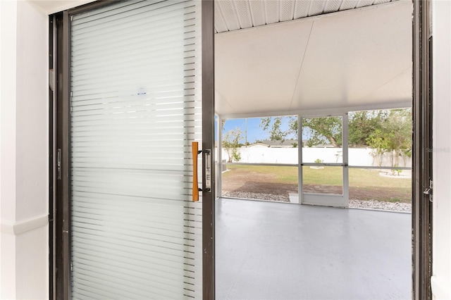 doorway featuring concrete flooring