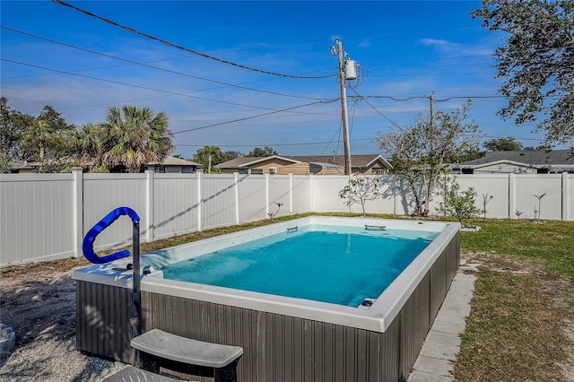 view of pool featuring a hot tub