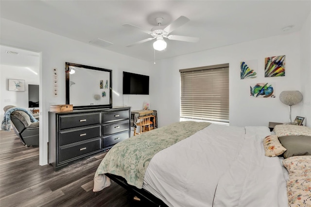 bedroom featuring ceiling fan and dark wood-type flooring