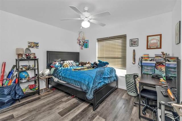 bedroom with hardwood / wood-style floors and ceiling fan