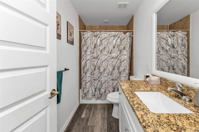 full bathroom featuring shower / bathtub combination with curtain, vanity, wood-type flooring, and toilet