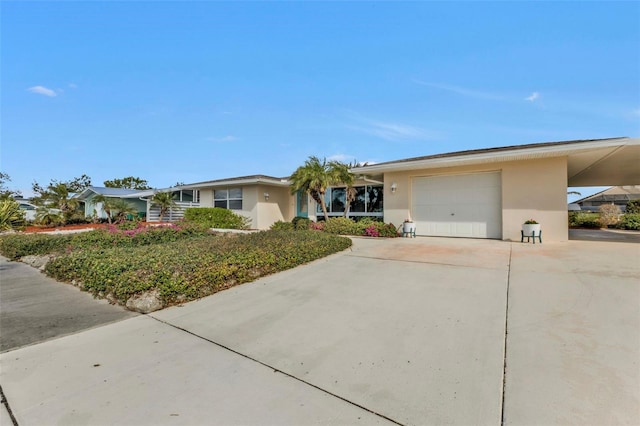 ranch-style home with a garage