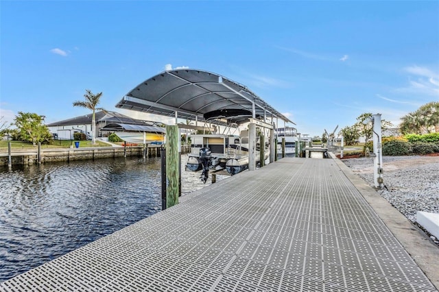 view of dock with a water view