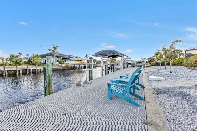 dock area with a water view