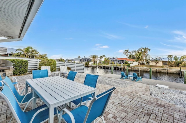 view of patio / terrace featuring a water view