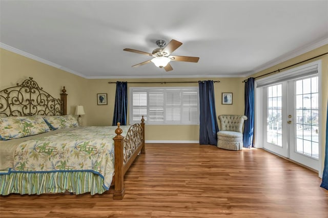 bedroom featuring ceiling fan, french doors, ornamental molding, access to outside, and hardwood / wood-style flooring