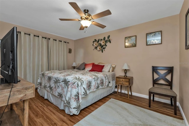 bedroom featuring ceiling fan and hardwood / wood-style floors