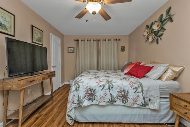 bedroom featuring wood-type flooring and ceiling fan