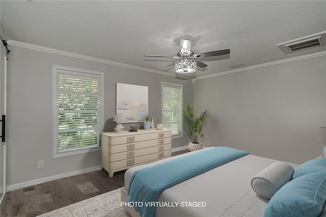 bedroom featuring ceiling fan, wood-type flooring, crown molding, and multiple windows