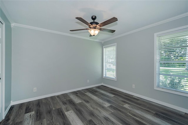 empty room with ornamental molding, ceiling fan, and dark wood-type flooring