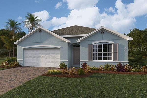 single story home featuring a front yard and a garage