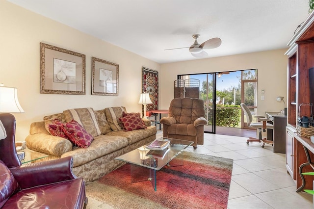 living room featuring ceiling fan and light tile patterned floors