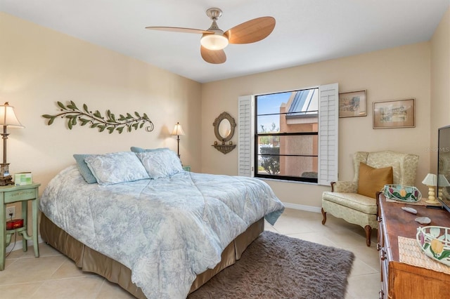 bedroom featuring ceiling fan and light tile patterned floors