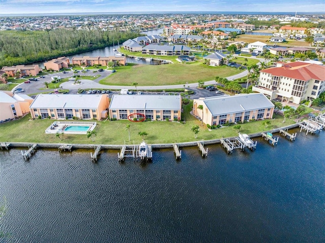 drone / aerial view with a water view