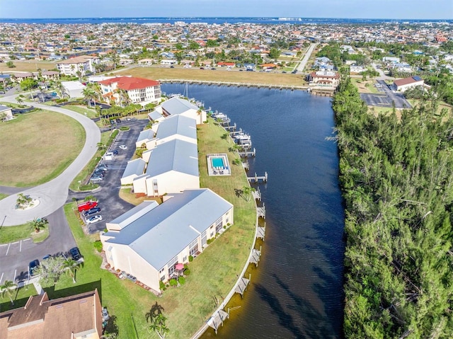 drone / aerial view with a water view