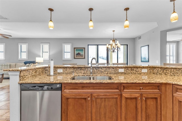 kitchen with stainless steel dishwasher, ceiling fan with notable chandelier, plenty of natural light, and sink