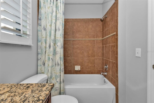 bathroom with shower / bath combo and toilet